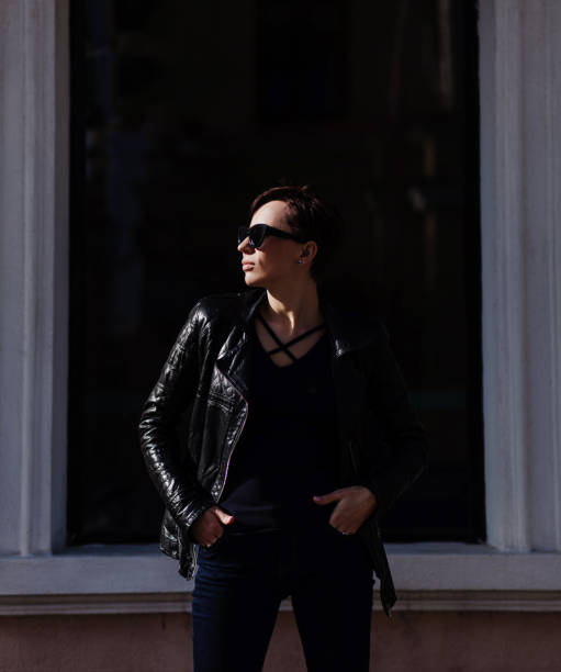 istock Hipster woman in leather jacket 1316089191