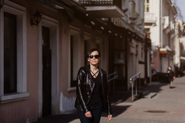 istock Beautiful stylish woman wearing black leather jacket 1316089204