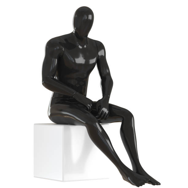 istock A black male faceless mannequin sits on a white cube on an isolated background. 3d rendering 1316091157