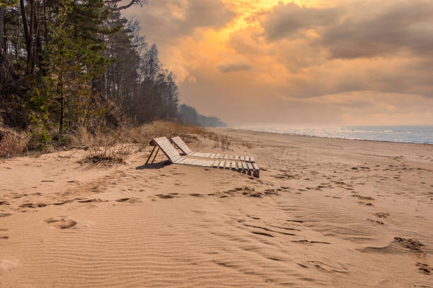 Two Lounge Chairs on an Empty Beach on the Baltic Sea