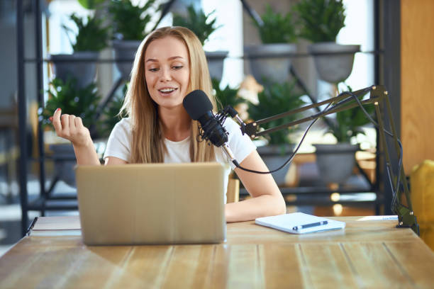 istock Young woman telling information in live broadcast. 1316095498
