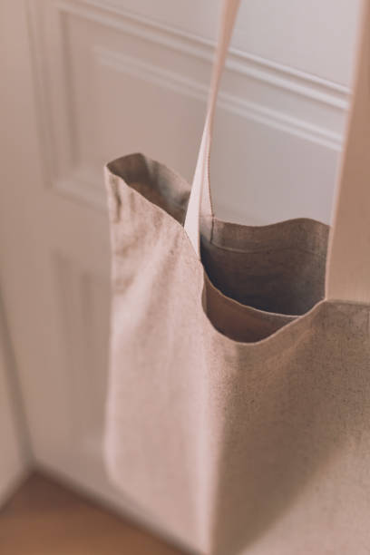 istock View of cloth bag hanging from doorknob 1316095756