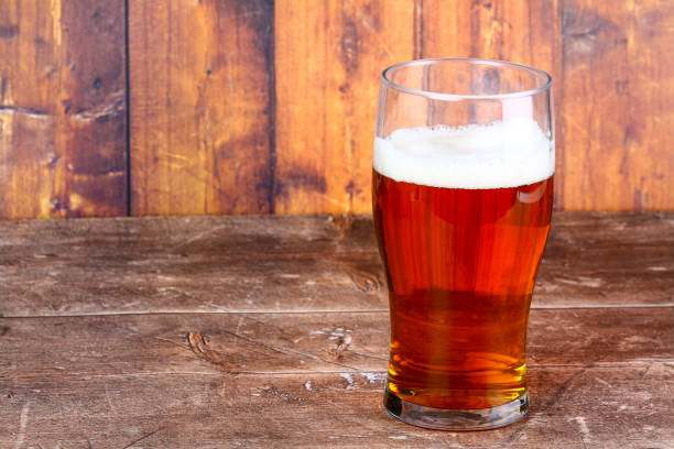 istock Pint glass filled with beer 1316096869
