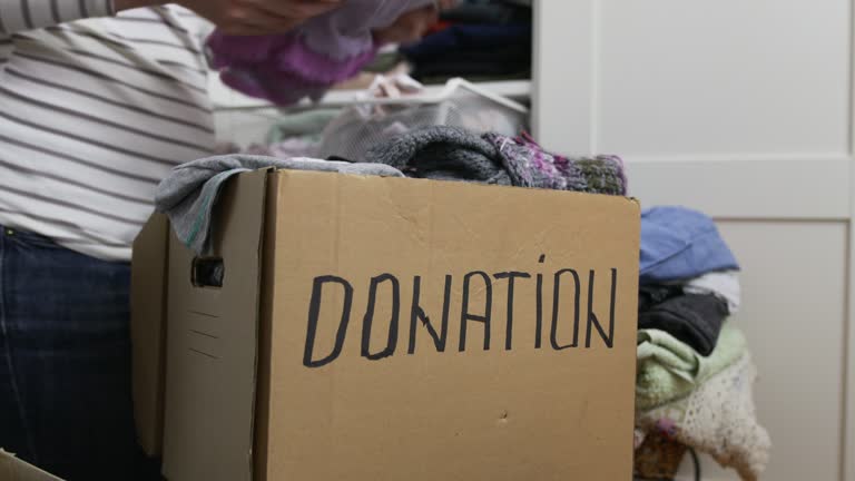 Sorting clothes for donation