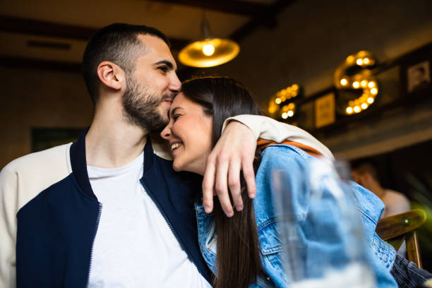 istock A handsome young man kissing his girlfriend on the forehead 1316104426