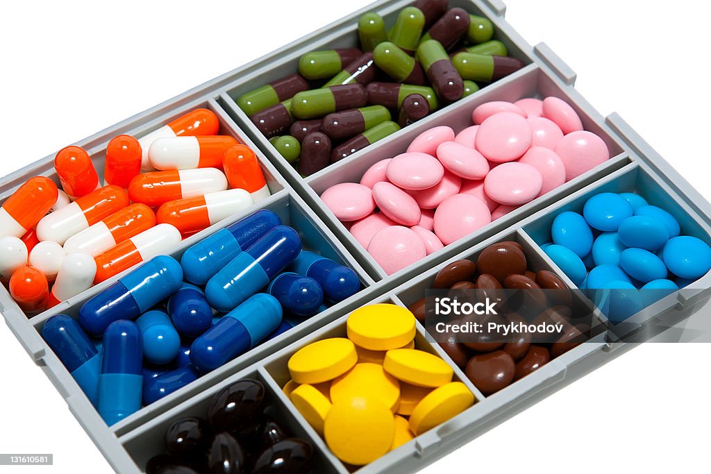 box with pill box with colored pills Addiction Stock Photo