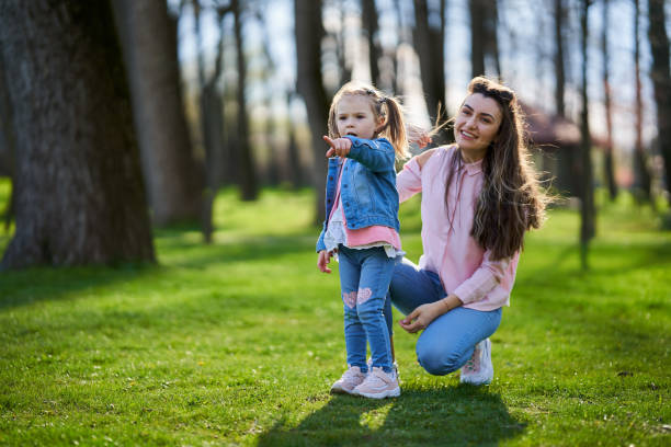 istock Mother and daughter in the park 1316110627