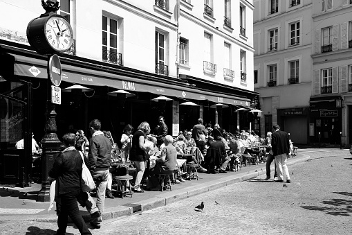 People visit Cafe Delmas on July 24, 2011 in Paris, France. Delmas cafe is a typical establishment for Paris, one of largest metropolitan areas in Europe.