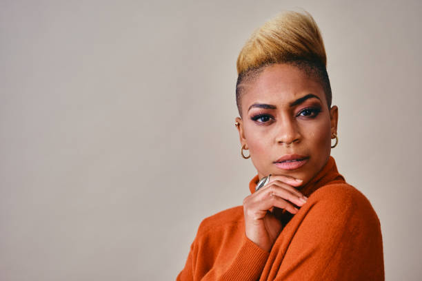 istock Contemplated Female Hipster Against Gray Background 1316113003