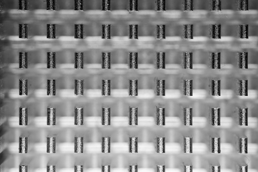 Abstract metallic patterns of a computer heat sink on a motherboard
