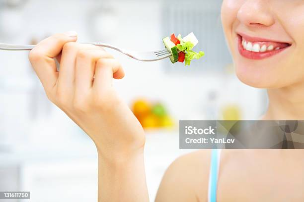 Eating Salad Stock Photo - Download Image Now - Fork, Salad, Eating
