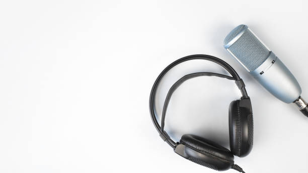 istock Headphones and microphone on light background, flat lay. Banner, copy space. Concept podcast, sound recording with place for text 1316128463