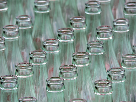 Vector background of glass soda bottles at a carnival game.