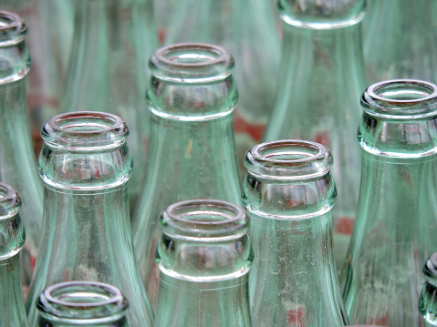 Vector background of glass soda bottles at a carnival game.