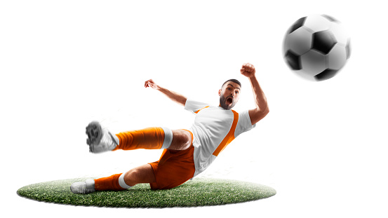 A soccer player kicks the ball. Isoalted. Sport