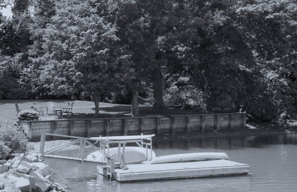 A dock at the Bluefish River Reservoir, Duxbury, MA stock photo