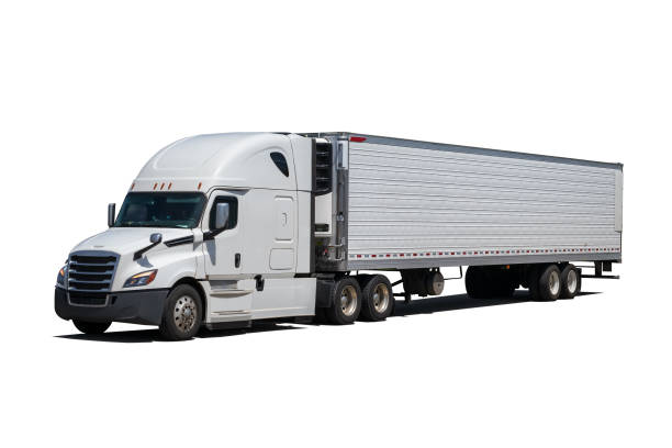 A cut out Semi Truck with White Cargo Container with clipping path. A cut out Semi Truck with White Cargo Container cleaned of all logos. Contains clipping path for removal from background. car transporter photos stock pictures, royalty-free photos & images