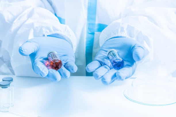 istock Different Covid 19 vaccines presented by laboratory scientist nurse. Various coronavirus vaccine choice. Pandemic prevention and immunization. Doctor in ppe shows vaccination research. 1316153947