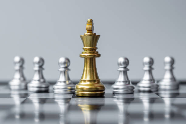 istock Chess king figure stand out from crowd of enemy or opponent during chessboard competition. Strategy, Success, management, business planning, disruption, win and leadership concept 1316159955
