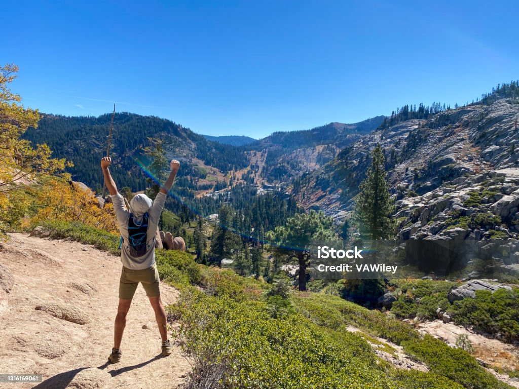 Man hiking in California back country Man with long beard hiking in the California wilderness. Lake Tahoe Stock Photo
