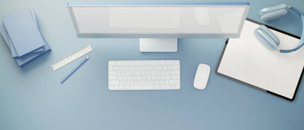 istock 3D rendering, creative flat lay of workspace with computer, digital tablet, accessories and stationery on blue background 1316176297