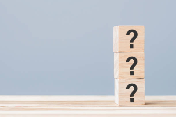 istock Questions Mark ( ? ) on wooden cube block on table background. FAQ( frequency asked questions), Answer, Q and A, Information, Communication and interrogation Concepts 1316179098