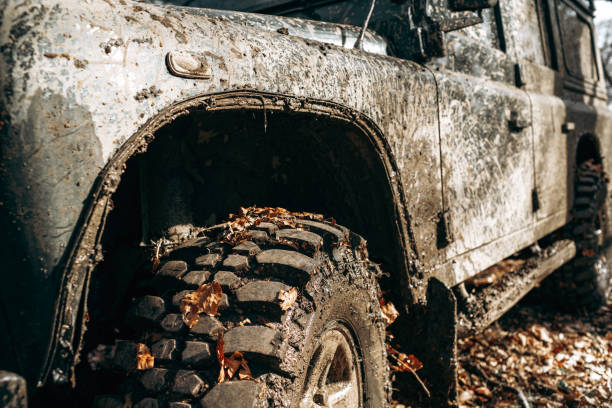 istock Dirty off road car on trip in forest 1316195285