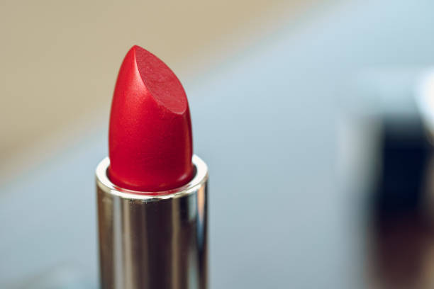 istock New red lipstick on vanity table close up 1316196511