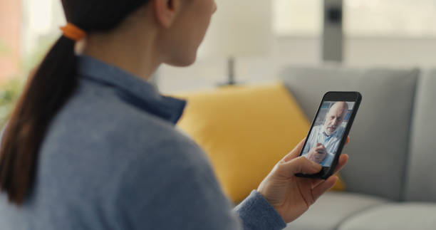 istock Woman video calling her doctor with her smartphone 1316196686