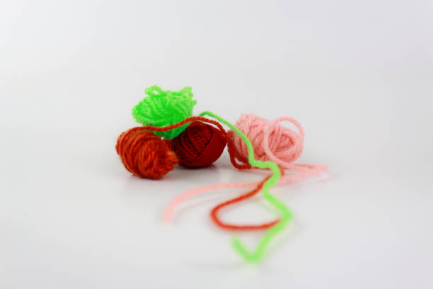 istock Multiple colors close-up yarn isolated on white background 1316198641