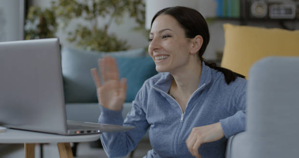 istock Cheerful woman video calling her friends 1316199626