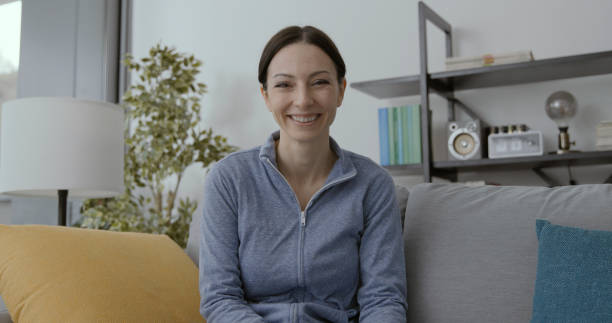 istock Smiling woman posing at home 1316200356