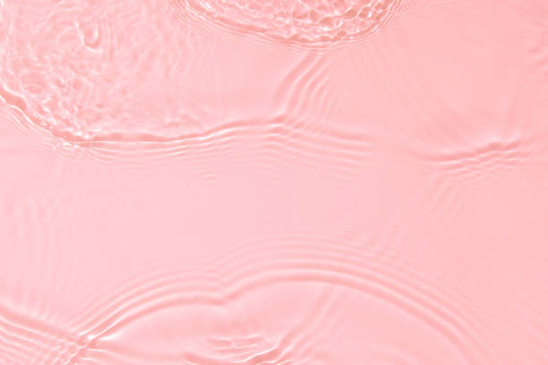 istock pink transparent clear water surface texture summer background 1316200484