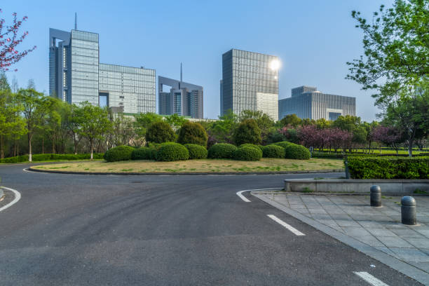 istock empty asphalt road front of modern buildings 1316200536