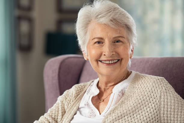 istock Happy senior woman smiling 1316203265