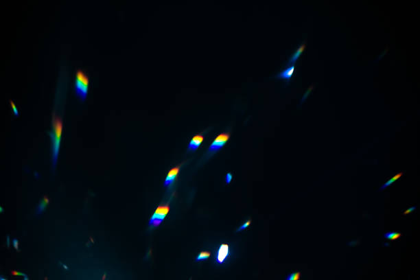 istock colorful warm rainbow crystal light leaks on black background 1316205281