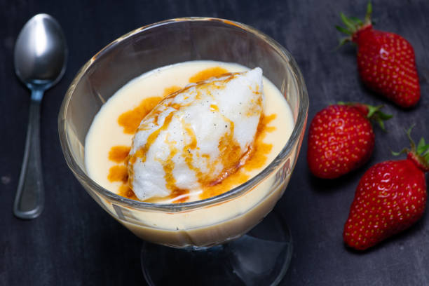istock Snowy eggs and custard recipe on black background 1316206930