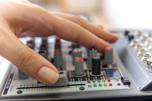 istock Man is adjusting EQ in music studio 1316212003