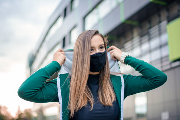 istock Urban girl with a mask on her face 1316213519