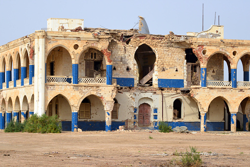 Taulud / T'walet Island, Massawa / مصوع / ምጽዋዕ, Northern Red Sea Region, Eritrea: Governor's Palace, known as Palazzo del Serraglio or Gibi - built in the 19th century for Swiss adventurer Werner Munzinger, the governor appointed by the Khedivate of Egypt, on the place of the 16th century Turkish palace of Osdemir Pasha, used as Governor's palace by the Italians and as Emperor Haile Selassie's winter palace - coral stone structure with bricks and reinfor.ced concrete, survived earthquakes but not war.