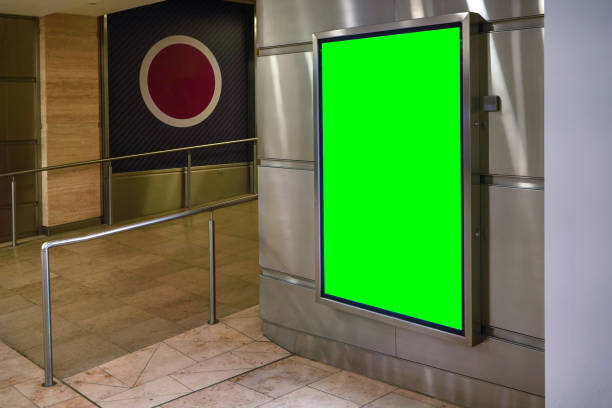 istock Wall with light display ad board - green color advertisement mock up, steel rail near 1316213704