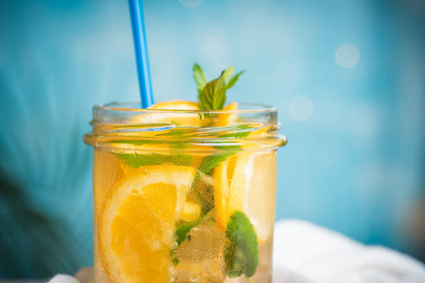 istock Lemonade with fruit slices infused with marijuana herbal cannabis in a jar 1316214529