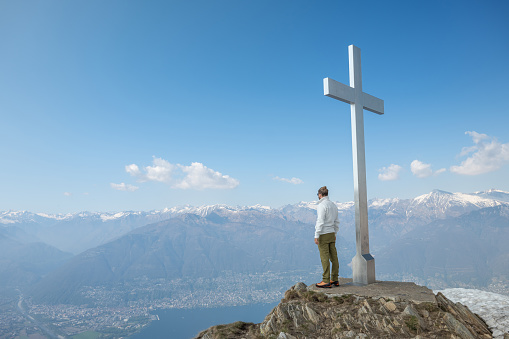 He looks across the lake
Ticino, Switzerland