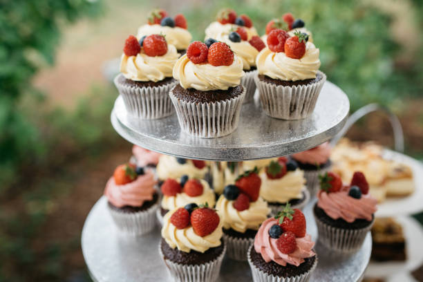 istock Cupcakes and crumble cake on cakestands 1316216905