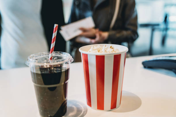 istock Focus on popcorn and drinks at the bar counter 1316217076