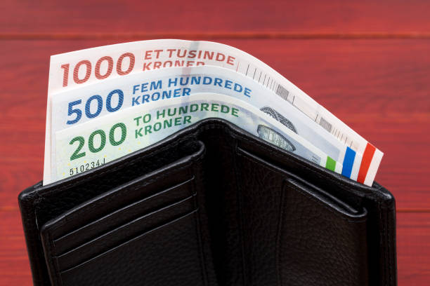 黒い財布の中のデンマーククローネ - danish currency ストックフォトと画像
