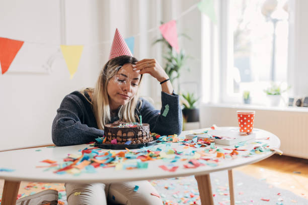 istock Sad woman celebrating birthday alone 1316219241
