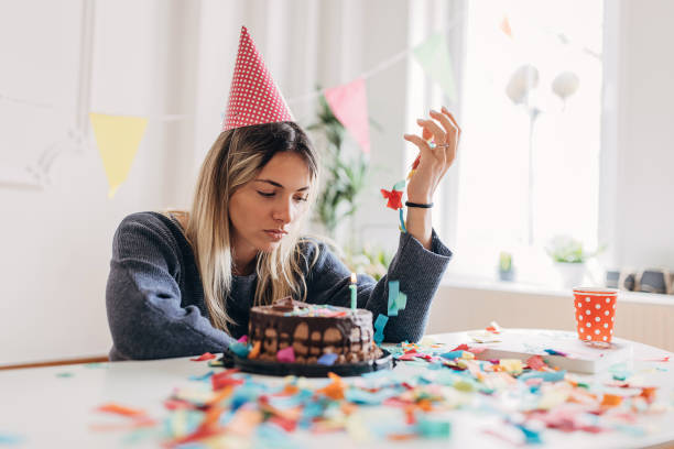 istock Sad woman celebrating birthday alone 1316219283