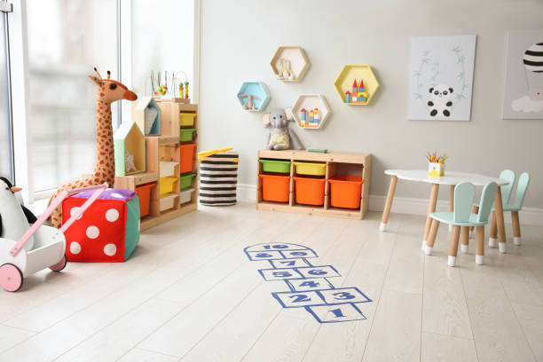 istock Blue hopscotch floor sticker in playing room 1316220402