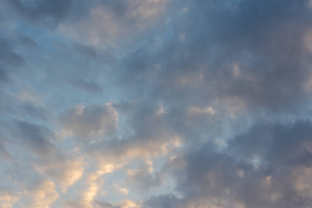 istock Beautiful sunset sky with multi-colored fluffy cumulus clouds. Heavenly background for your photos 1316220829